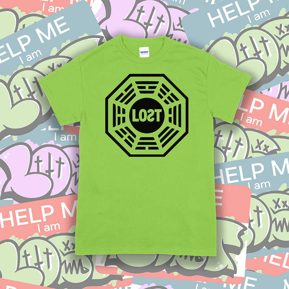 The Lost Initiative t-shirt by Lost Streetwear. The bold black logo is screen printed on a lime green shirt. A wall of brightly colored graffiti stickers make up the background.