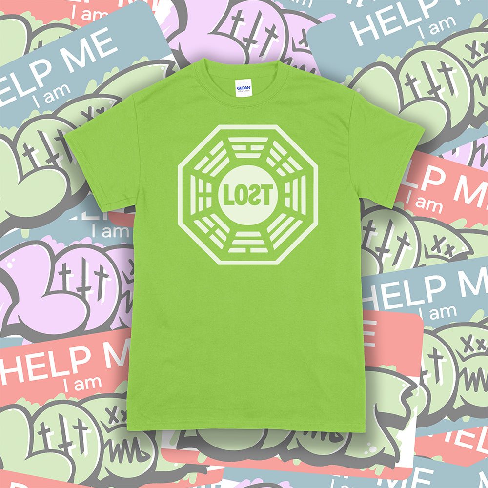 The Lost Initiative t-shirt with a large solid white logo screen printed on a lime green shirt. A collection of colorful LOST graffiti stickers make up the background.