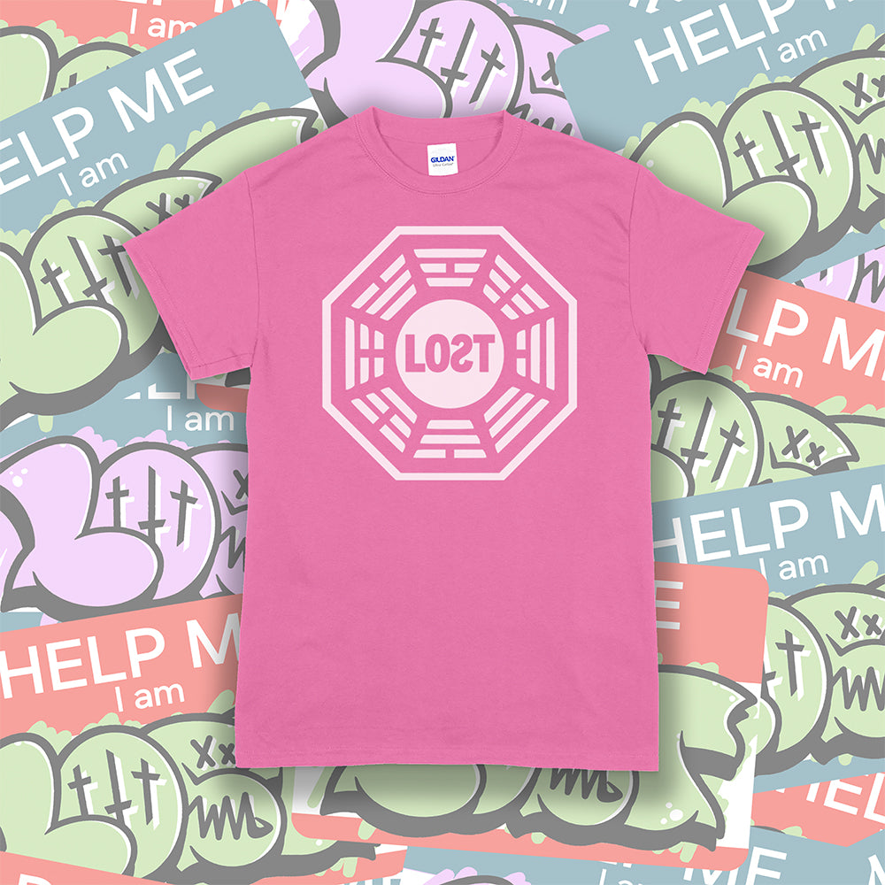 The Lost Initiative t-shirt with a large solid white logo screen printed on a bright pink shirt. A collection of colorful LOST graffiti stickers make up the background.