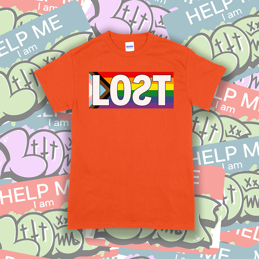The Progress Flag shirt design by Lost Streetwear. Full color design displayed on an orange t-shirt. A collage of graffiti stickers provides a creative background for the shirt.